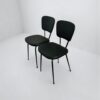 Chaise-design-en-simili-cuir-noir-salon